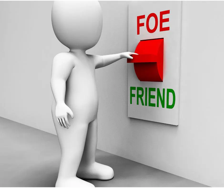 person choosing friend or foe button